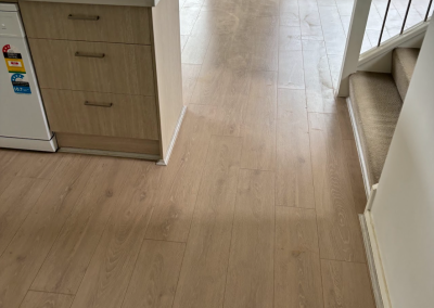 Laminate flooring finished at the base of the staircase, Schofields Sydney