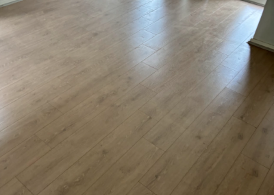 Completed laminate flooring installation in a Schofields home, Sydney
